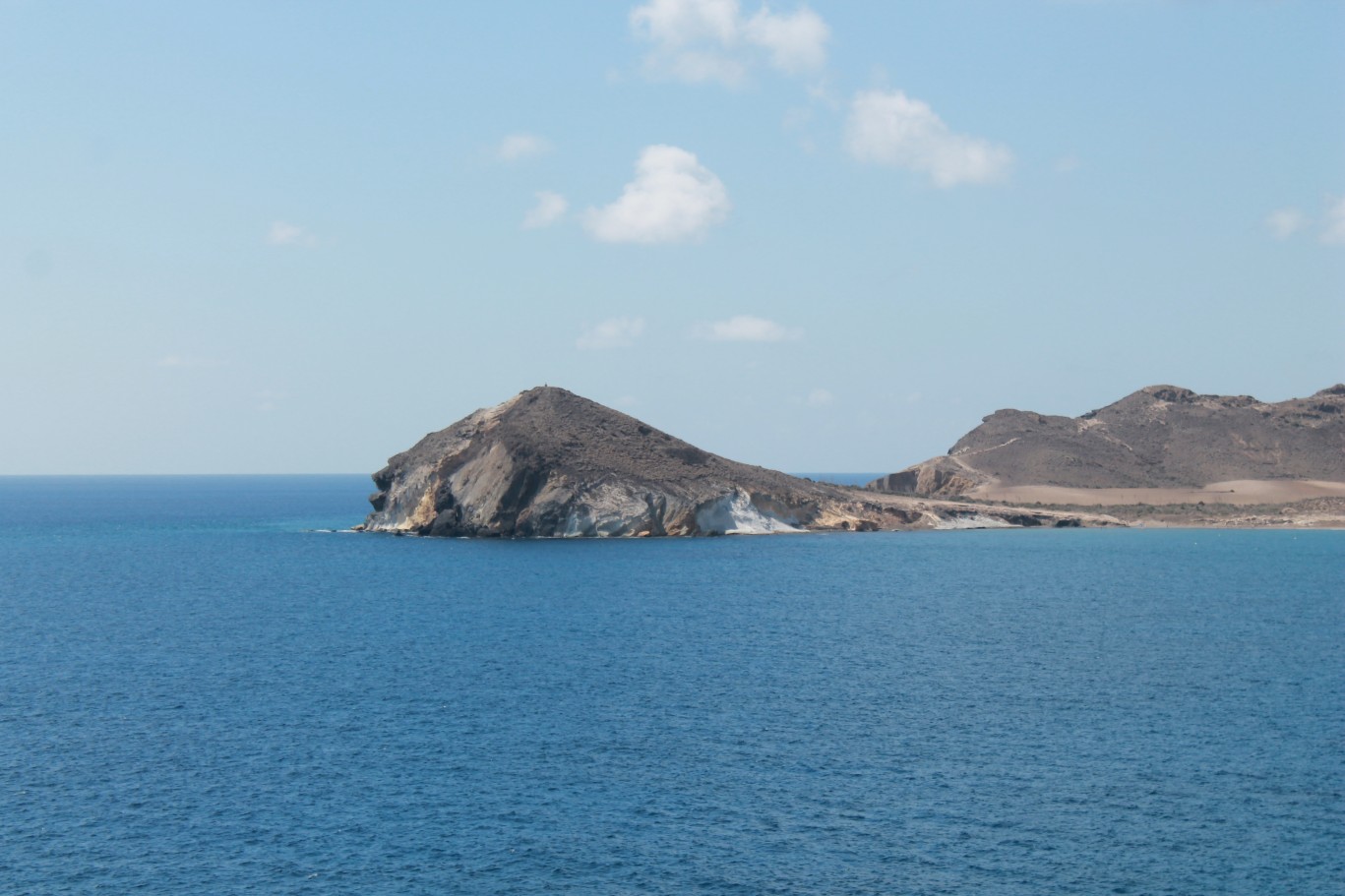Discover Cabo de Gata Spain: View of the "Morron de los Genoveses" which overlooks the bay, Costa Almeria